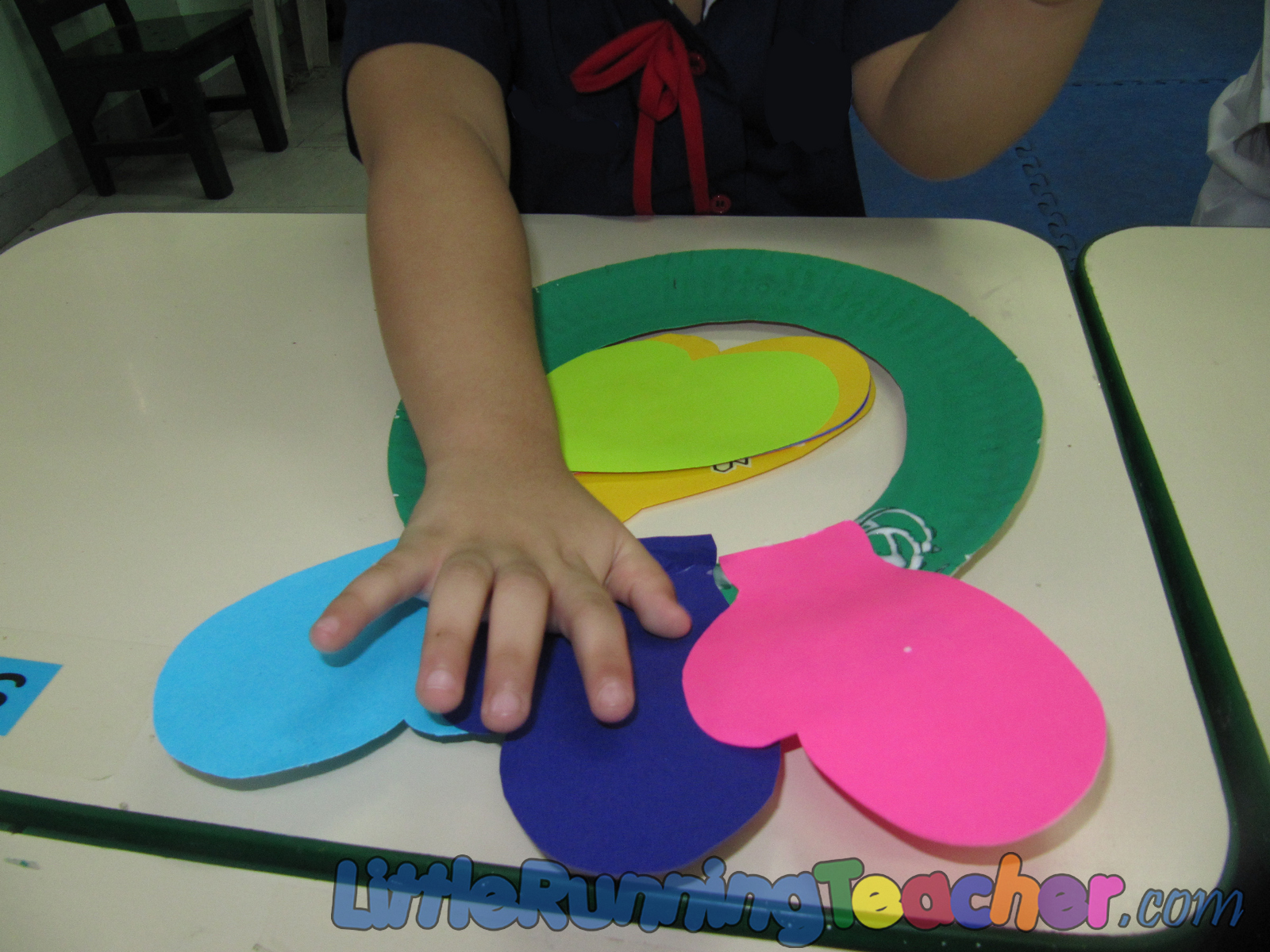 Colorful Mitten Christmas Wreath « Little Running Teacher